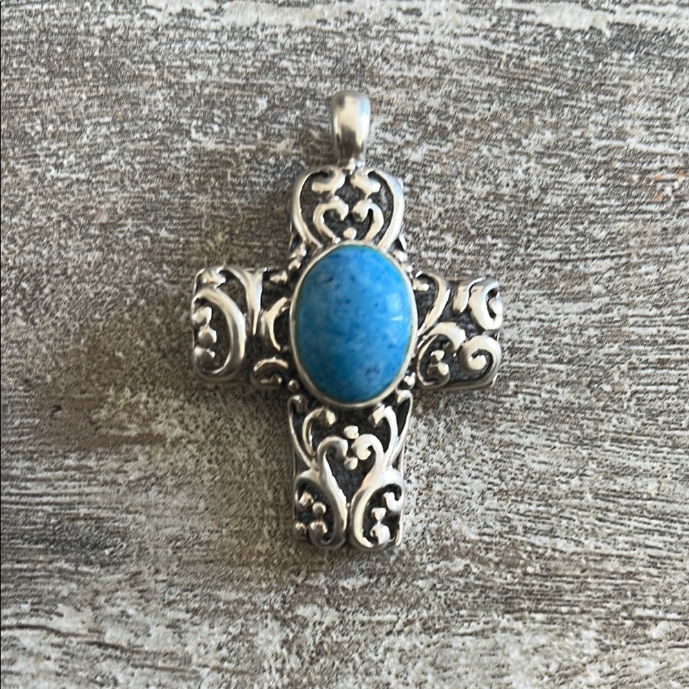 Elegant Silver Cross Pendant with Blue Stone